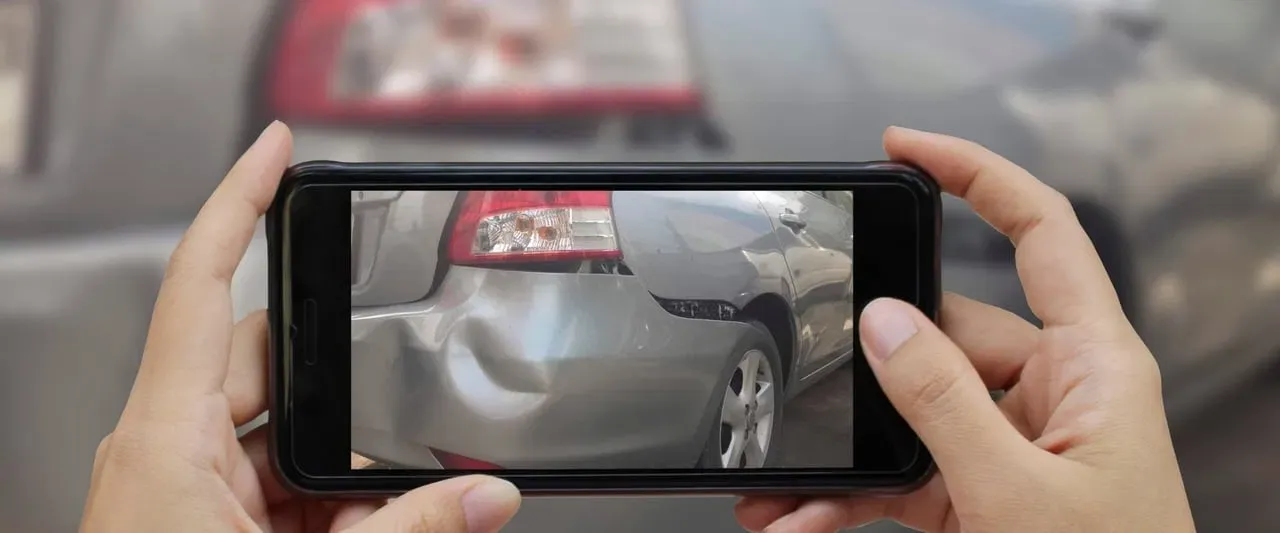 Photographing vehicle damage for a collision claim review